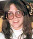 KELLY BERGH DOVE has been missing from Harrisonburg, VA since 18 Jun 1982 after calling police to report a man was harassing her at work.