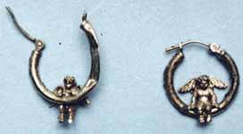 These earrings were found in a grave with #JaneDoe!  Do they look familiar?  Valencia, #CALIFORNIA 1995